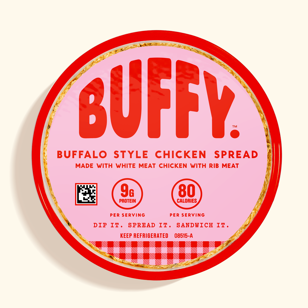A round pink and red package of BUFFY Buffalo Style Chicken Spread, featuring bold red lettering and nutritional callouts on a light cream background.