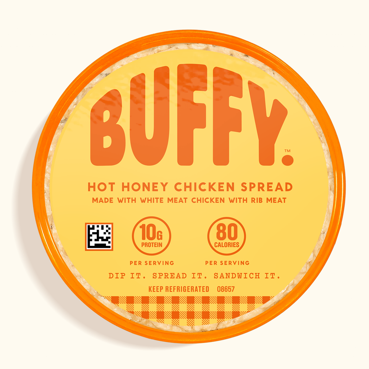 A round container of BUFFY. Hot Honey Chicken Spread, featuring a bright yellow label with bold orange lettering and an orange rim, set against a light cream background.